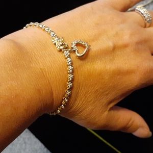 Gold over sterling diamond heart toggle tennis bracelet 7 3/4" two tone